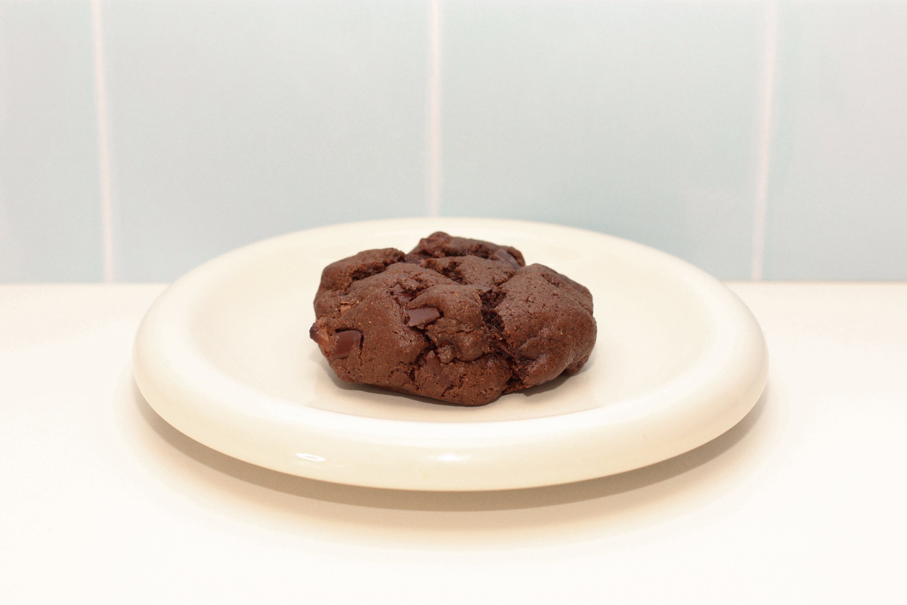 Close-up of Milk it triple chocolate chunk lactation cookie – breastfeeding snack made with oats, flaxseed, and brewer’s yeast